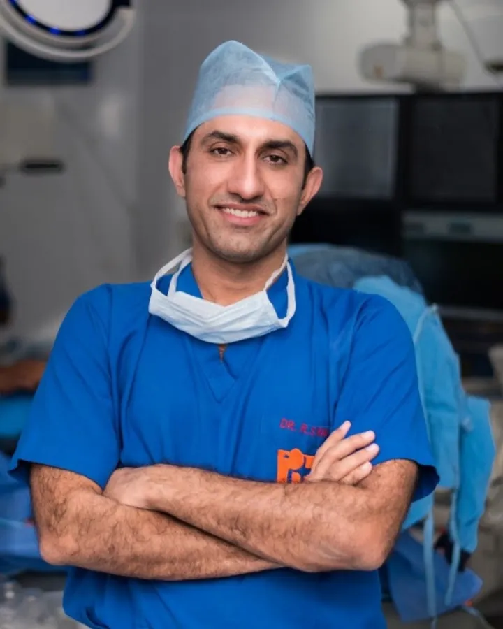 Dr. Ravinder Singh Rao in scrubs in the catheterisation lab